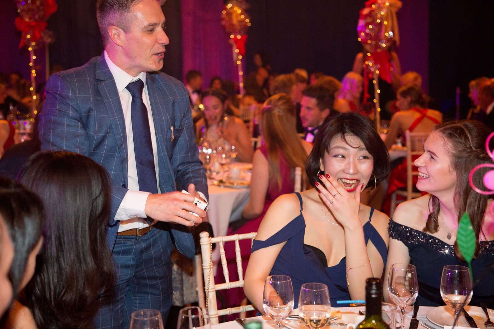James Anthony performing close-up magic at a Leeds corporate event