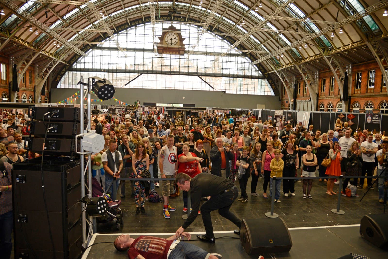 Large crowd watching James Anthony's stage hypnosis show at the Manchester Tattoo Show