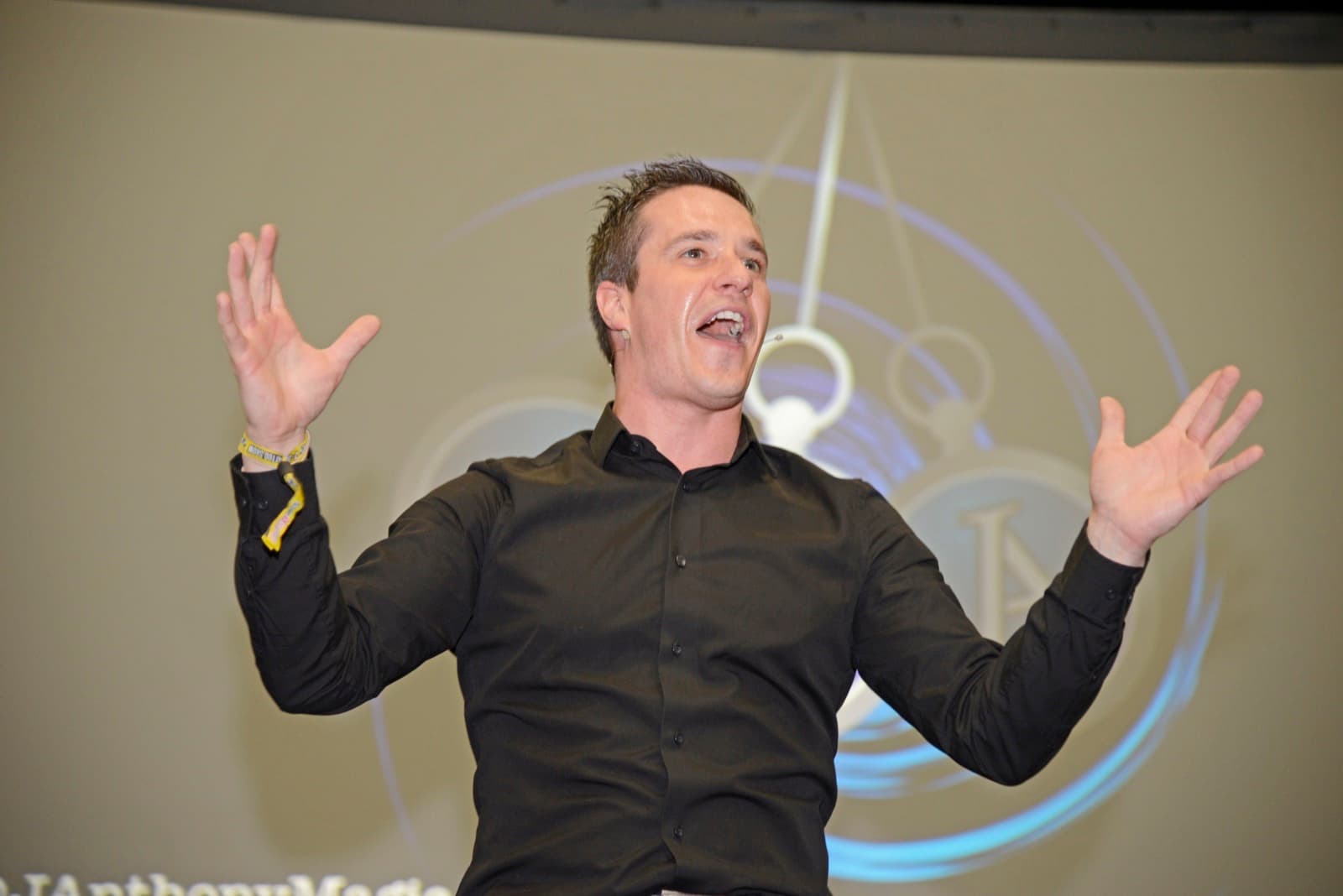 Stage hypnotist James Anthony performing live on stage