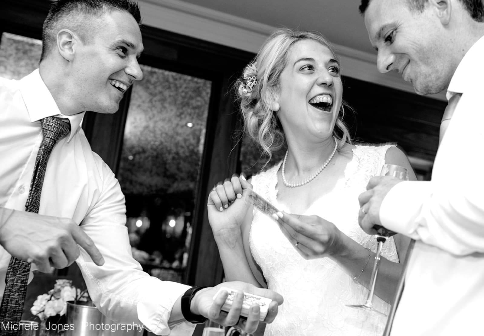 Wedding guests amazed by a card trick
