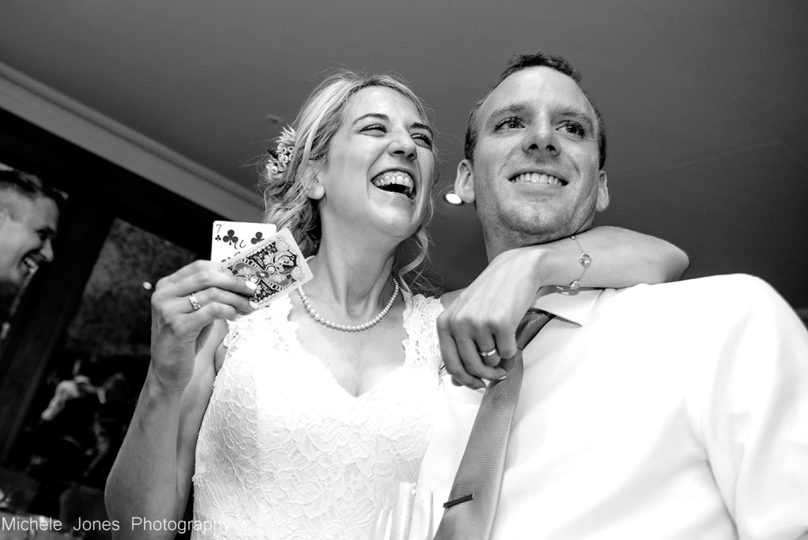 Wedding guests watching a card trick